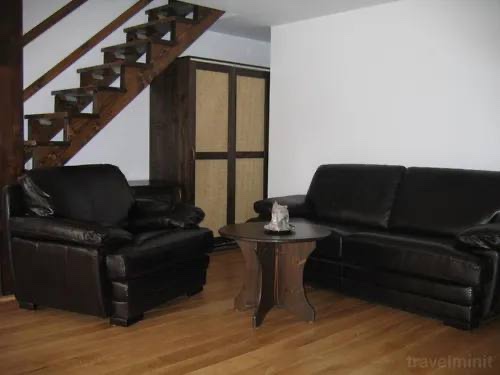 Camera Cvadrupla Deluxe cu Balcon — living area