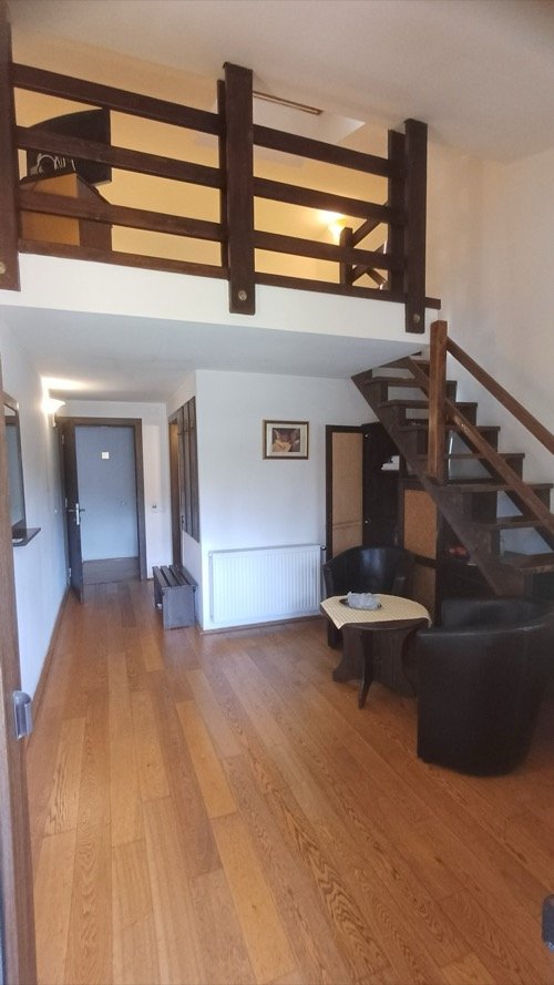 Camera 4 – Cameră Duplex Junior — downstairs living area