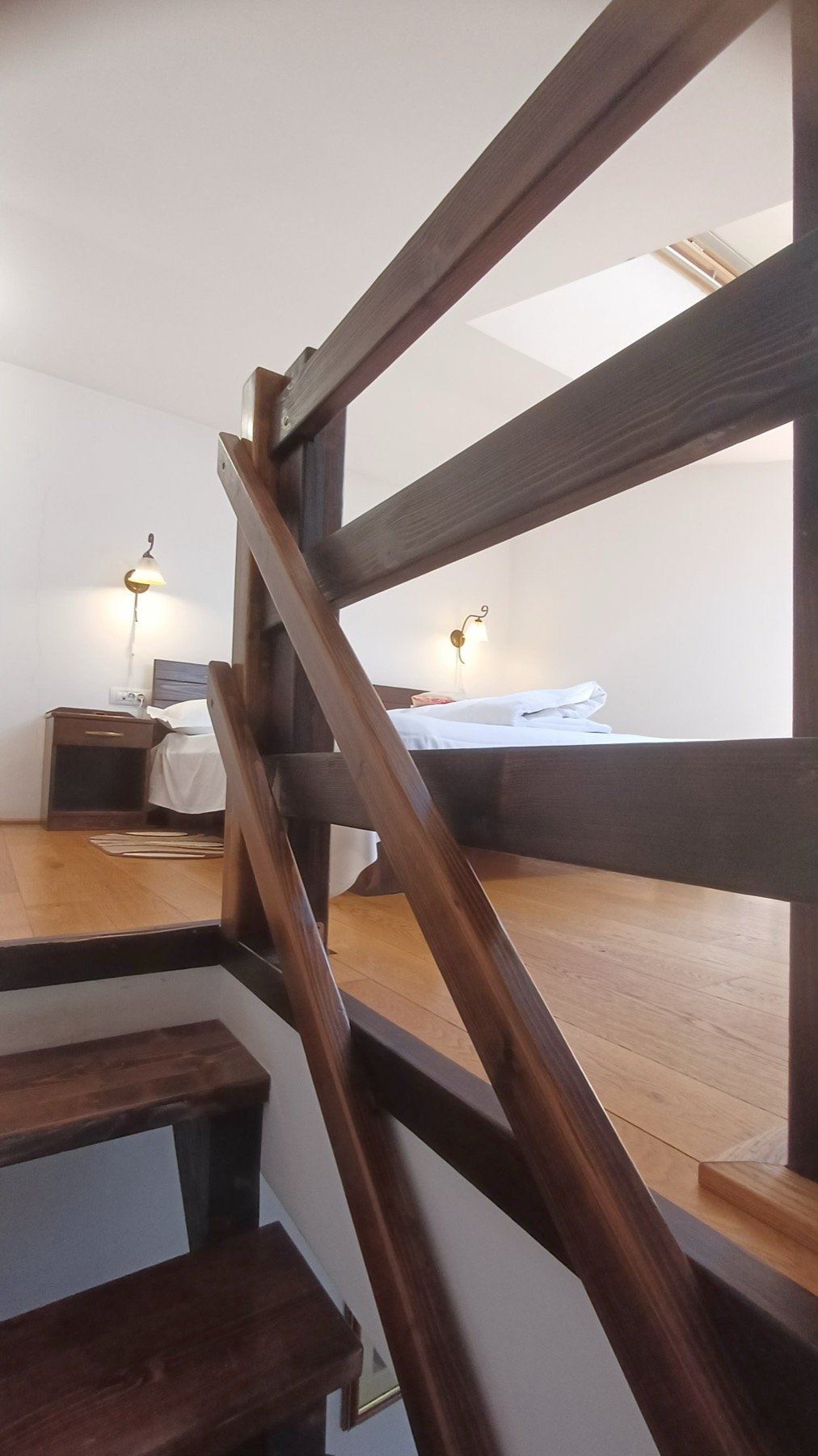 Room 3 – Junior Duplex — stairs up to the loft bedroom
